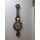 A 19th century rosewood barometer with hydrometer, thermometer above a silvered dial - Height 95cm