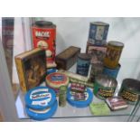 A collection of old shop and other tins