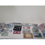 A 2000 Portugal seven coin set boxed, two Egyptian coins and assorted French, Spanish and Portuguese