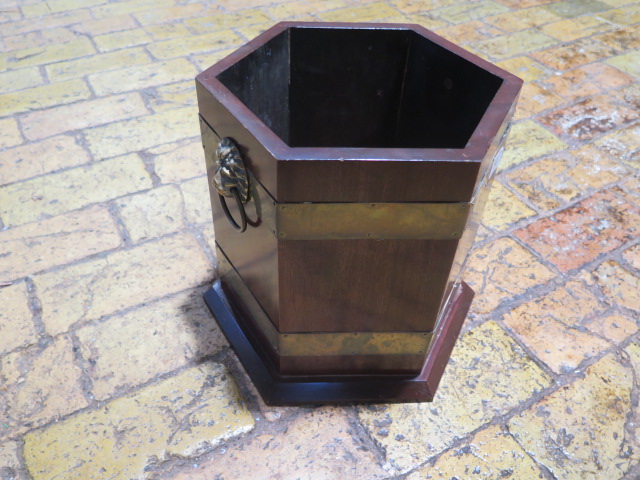 A brass bound mahogany hexagonal planter - Height 30cm x Width 32cm