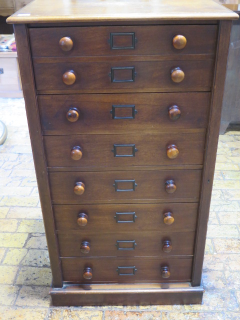 A late Victorian mahogany seven drawer Wellington chest with a fitted double top drawer stamped J
