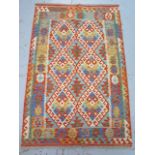 A hand knotted woollen Chobi Kilim rug - 153cm x 101cm