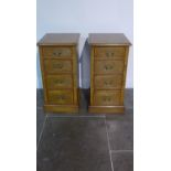 A pair of burr oak four drawer bedside chests made by a local craftsman to a high standard