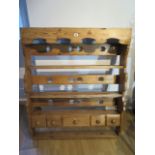 An ornate pine plate rack wall shelf with five small drawers incorporating old timbers - Height