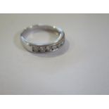 A hallmarked 18ct white gold seven stone diamond ring 0.50ct, ring size L, approx 3.3 grams,