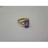 A hallmarked 22ct yellow gold amethyst ring size R - approx weight 3.6 grams - head approx 9mm x 5mm