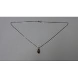 A hallmarked 9ct white gold pearl pendant on chain, 40cm long, approx total weight 3.8 grams, in