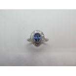 A fine quality platinum pear shape Ceylon sapphire, baguette and round brilliant cut diamond ring