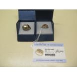 Two GTV 9ct yellow gold rings, one with 3 colour change garnets with certificate, size N, the
