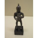 A bronze figure on stand with patinated finish - Height 10cm