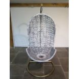 A repainted egg swing chair - Height 192cm
