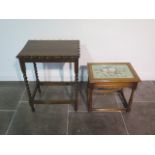 A small oak coffee table with needlework panel under glass on baluster turned legs - height 47cm x