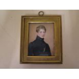 A good 19th century miniature of a young man in a brass frame, miniature 10cm x 7cm frame 13cm x