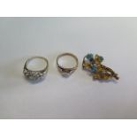 Two 9ct gold dress rings size L and a gold brooch tests to approx 9ct - total weight approx 8 grams