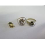 Two 14ct yellow gold rings and a 14ct gold sandal charm - rings size N - total weight approx 5.8