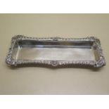 A silver pen tray with embossed border Chester 1903/04, maker GN RH - 22cm x 9cm x 2cm - approx