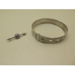 A silver Charles Horner buckle bracelet Chester 1943 engraved inside and a small brooch marked CH