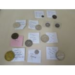 An interesting collection containing 52 coins and tokens dating from Roman onwards including two