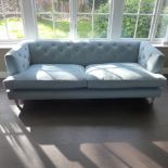 A John Lewis four seater sofa - in good condition