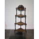 A Victorian inlaid walnut four tier corner whatnot in fully restored condition - height 122cm