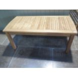 A teak garden coffee table - as new - ex display - width 120cm x height 50cm