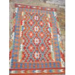 A hand knotted woollen Chobi Kilim rug - 1.45m x 1.00m