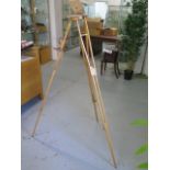 A Houghton and Butcher Ensign folding tripod stand - in good condition