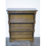 An old charm oak open bookcase with three shelves and bobbin turned supports - height 96cm x width
