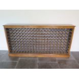 A good quality burr walnut veneered wine rack made by a local furniture maker to a high standard -