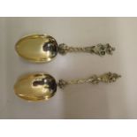 Two Continental silver gilt spoons - 17cm and 18cm long - approx total weight 3.2 troy oz - both