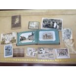 An interesting postcard and photograph album including some Military