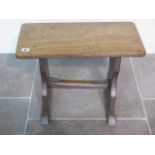 An elm stool - height 42cm x 55cm x 28cm