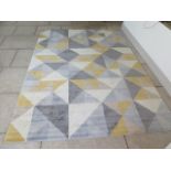 A modern rug measuring 200cm x 290cm - as new