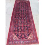 A blue ground Iranian runner unique all over design - 3.00m x 1.10m - generally good condition