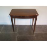 A restored 19th century mahogany bowfronted side table - height 71cm x 82cm x 47cm - in solid