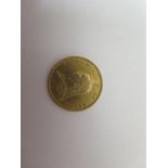 A Victorian shield back gold half Sovereign dated 1887 - pendant solder mark to top