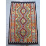 A hand knotted woollen Chobi Kilim rug - 120cm x 70cm