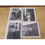 Four very early 10in x 8in photographs of The Beatles - before they were famous, taken in someones