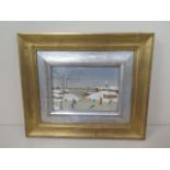 An oil on board Dutch scene signed bottom right - in a gilt frame - 28cm x 33cm - in good condition