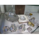 An assortment of plated items including a basket and a pair of candlesticks - all in polished