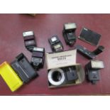 A collection of six vintage camera flash units including Centon Ring Flash, Cobra, Miranda, Vivitar,