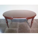 A Victorian style mahogany extending table with one leaf - extends from 120cm x 115cm to 167cm x