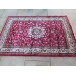 A red ground Kashmir carpet shabus medallion rug - 2.40m x 1.60m - generally good condition