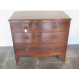 A 19th century mahogany four drawer chest on bracket feet - height 87cm x 91cm x 48cm - some marks