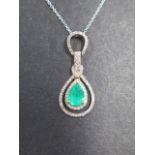 A good quality 18ct yellow gold Art Deco style pear shaped emerald and diamond pendant on an 18ct