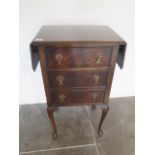 A mahogany single drawer drop leaf bedside table - height 71cm x 65cm extended x 31cm