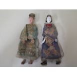 A Chinese pair of early 19th century official dolls dressed in traditional court costumes