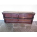 An Edwardian mahogany display shelf - height 64cm x 158cm x 17cm - in good polished condition