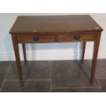 A 19th century mahogany two drawer side table - height 73cm x 92cm x 52cm