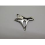 A Georg Jensen silver brooch by Henning Koppel with black enamel decoration HK number 323 - length